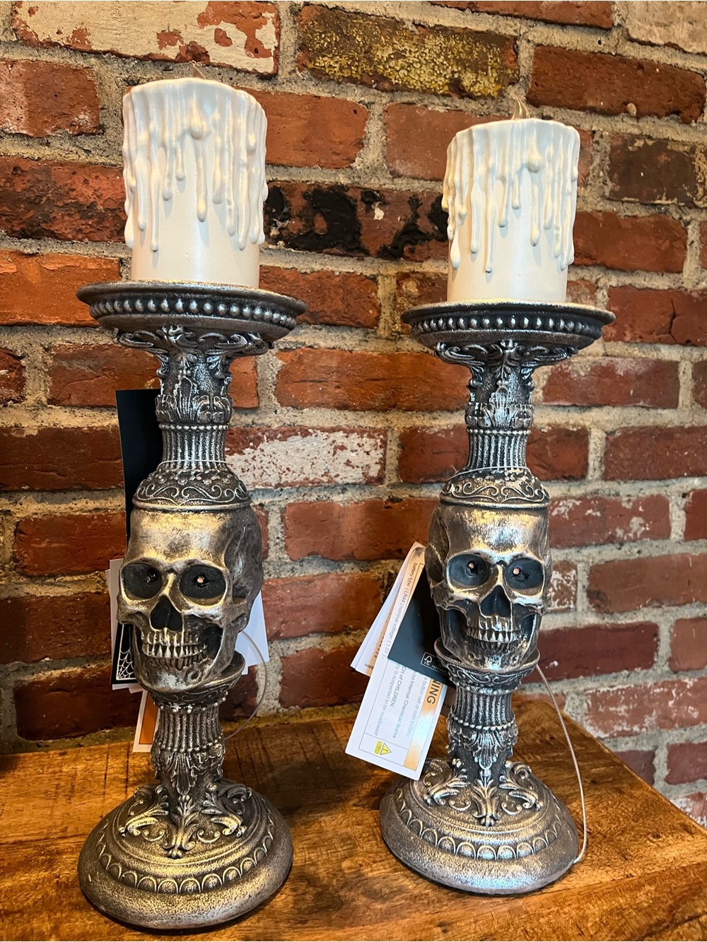 Martha Stewart Silver Skull Candle sticks-with Cream Drip Candles